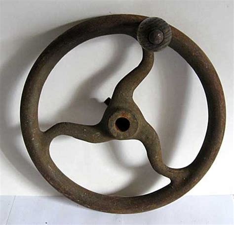 antique industrial iron hand crank wheel  wood handle