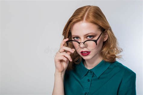 woman in glasses woman on a white background beautiful redhead