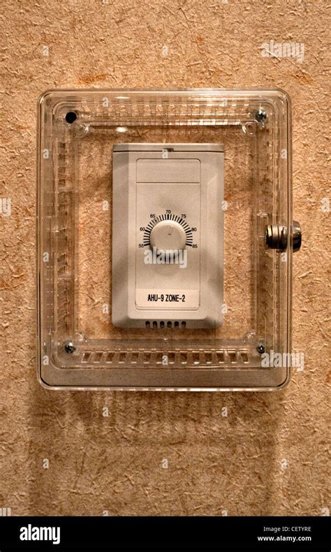 central heating thermostat protected   clear lockable cover stock photo alamy