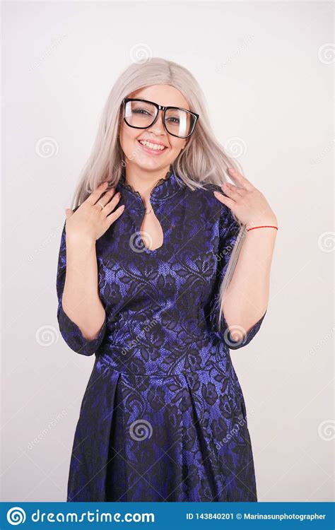 Beautiful Blonde Girl With Glasses In Luxurious Blue With Black Lace
