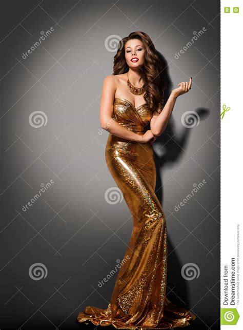fashion model girl posing glamour gold dress elegant