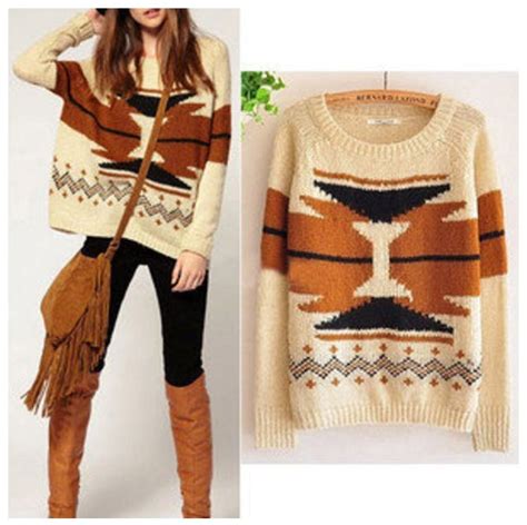 large native american sweater with skinny pants and boots