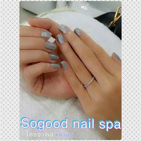womans hands  silver nail polish  top   nails