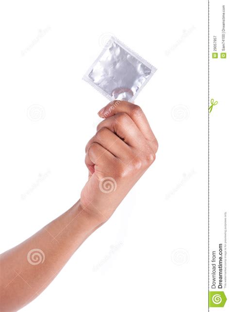 safe sex concept african woman hand with condom royalty