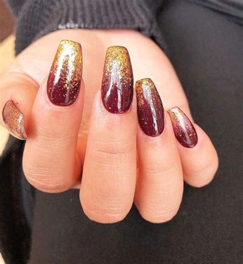 hottest maroon  gold nails trending