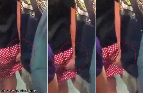 caught on camera pervert touching woman s bottom on mrt singapore