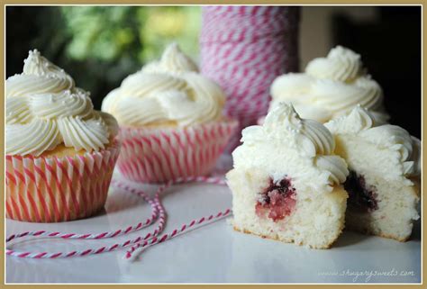 almond wedding cake cupcakes  raspberry filling shugary sweets