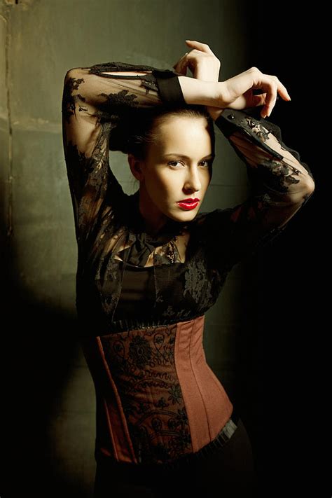 Beautiful Young Woman Wearing Corset Posing Photograph By Anna Bryukhanova