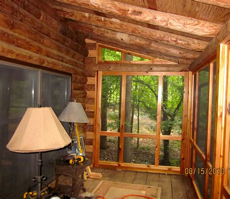 beautiful screened  porch added   log cabin porch built