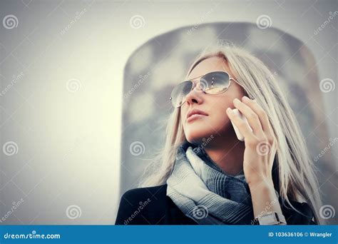 Blond Fashion Business Woman In Sunglasses Talking On Mobile Phone
