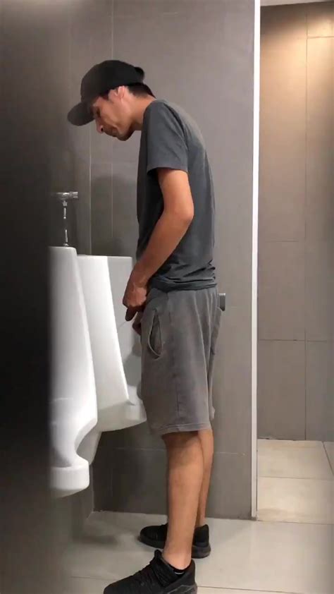 Spying Men Pissing At Urinal 2
