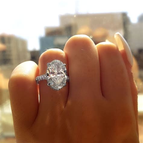 brilliant oval cut diamond engagement ring designed  diamond mansion