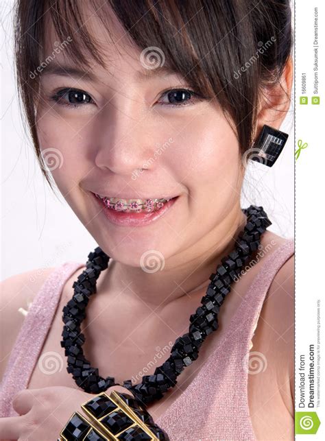 asian braces girl with sexy smile stock image image 16609861