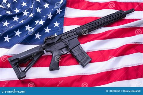 custom built ar  carbine  american flag surface background studio shot stock photo