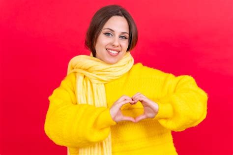 Premium Photo Young Brunette Woman Wearing Yellow Sweater Over