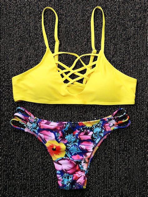 yellow top floral bottom black background bathing suits