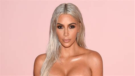 Kim Kardashian Sports Thong And Low Cut Top In Sexy