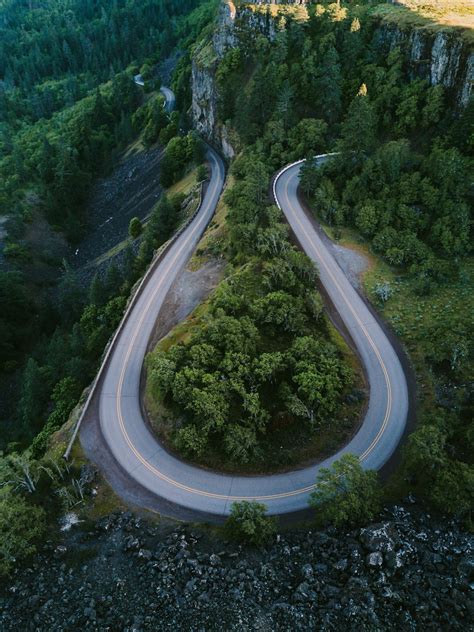 curved road pictures   images  unsplash