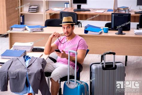 young employee preparing   trip stock photo picture  rights