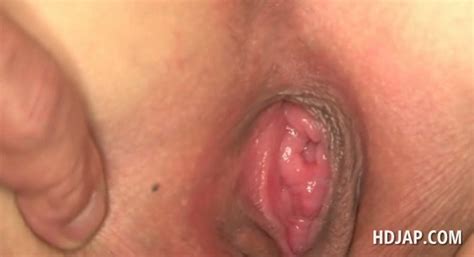 close up with wet pink asian pussy hole wide spread