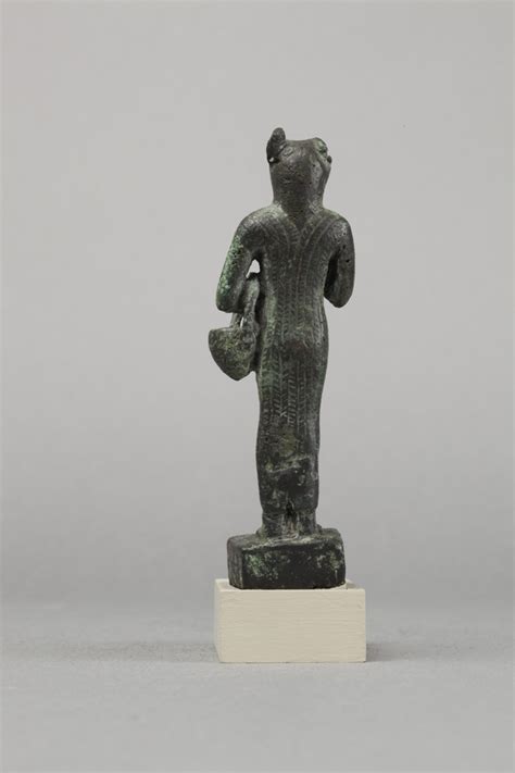 bastet with lion headed aegis and basket late period ptolemaic period