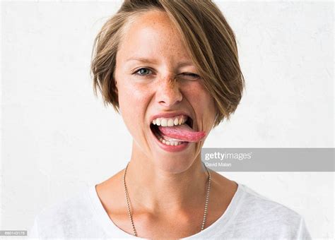 Blonde Woman Sticking Out Her Tongue Photo Getty Images