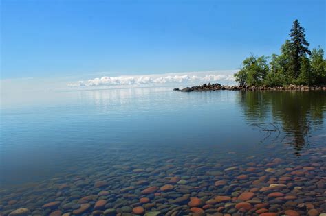 clouds floating   lake superior minnesota  july  ocx rearthporn