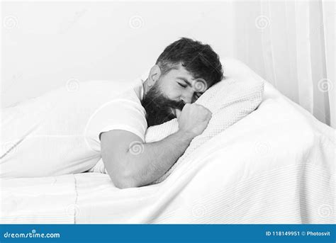 Good Morning Man In Shirt Laying On Bed White Wall On Background Nap