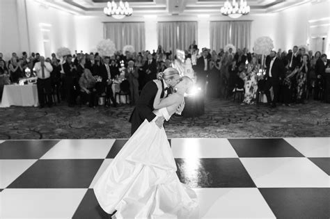 classic timeless bride and groom black and white first dance dip