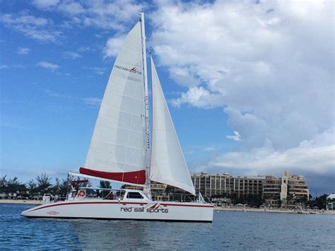 red sail sports grand cayman welcomes the spirit of the islands