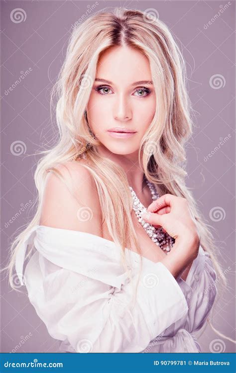 Portrait Of Beautiful Sensual Blonde Girl In White Shirt Stock Image