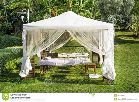 white tent for the patio to put the massage tables under outdoor spa