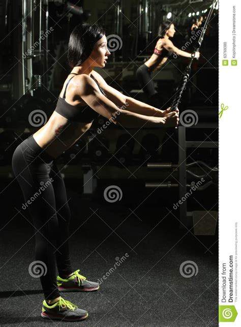Brunette Fitness Girl Perfect Body In Gym Doing Stock