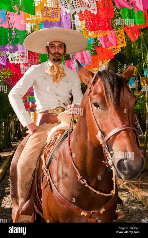 guadalajara mexico charro mexican cowboy riding horse  cobblestone street club charro