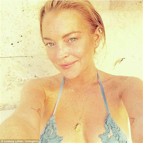 Lindsay Lohan Shows Off Her Cleavage In Busty Bikini Selfie Daily