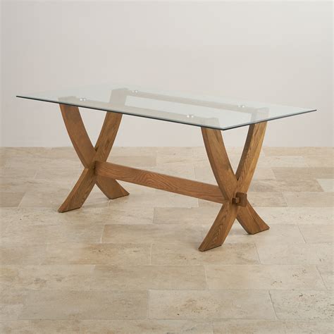reflection glass top dining table  solid oak crossed legs