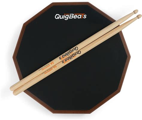 quigbeats drum pad and drum sticks silent drum practice pad