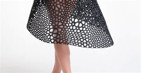 this dress is made from 3 d printed plastic but flows like fabric wired