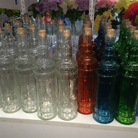 Glass Bottles With Corks In Various Colors From The Dollar Tree Glass