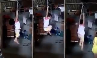 girl is strung up by wrists by cruel vietnamese foster mum daily mail