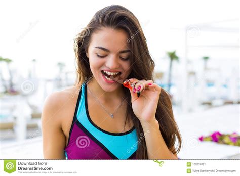 sporty woman eating chocolate stock image image of chocolate eating