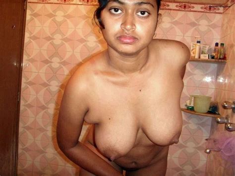 girl posing nude in bathroom showing big boobs and pussy pics