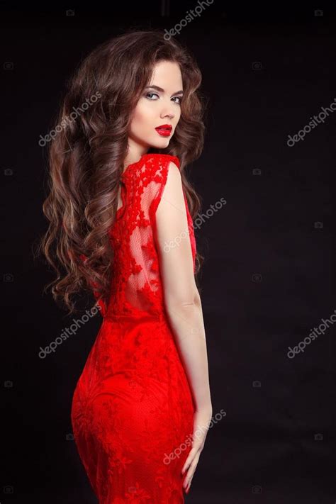 Beautiful Sexy Woman In Red Fashion Dress Isolated On Black Back Stock