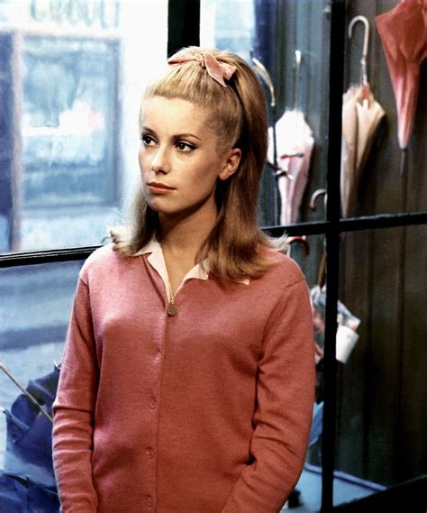 iconic women who wore a hair ribbon from catherine deneuve to madonna