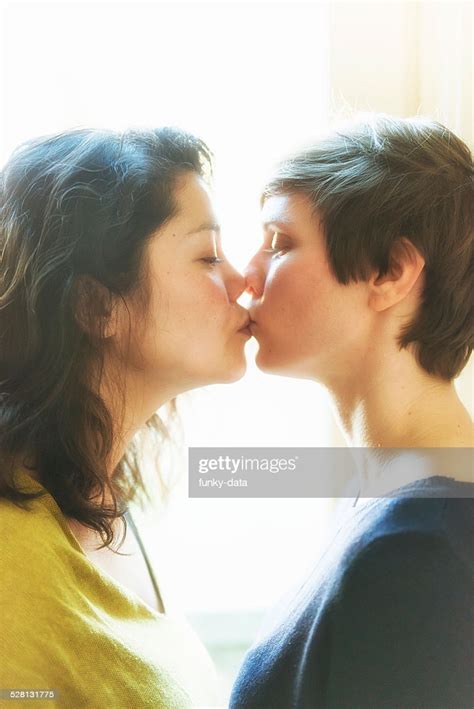 real life lesbian couple sincerely kissing high res stock