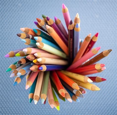 pick   colored pencils   appointed desk