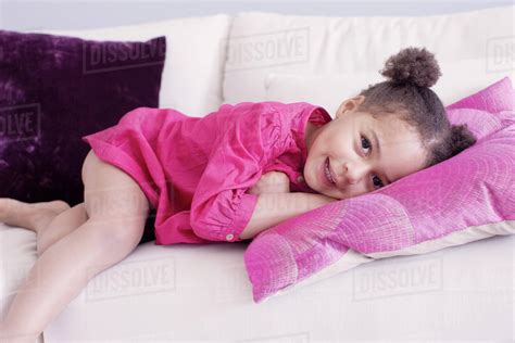 girl lying  couch stock photo dissolve