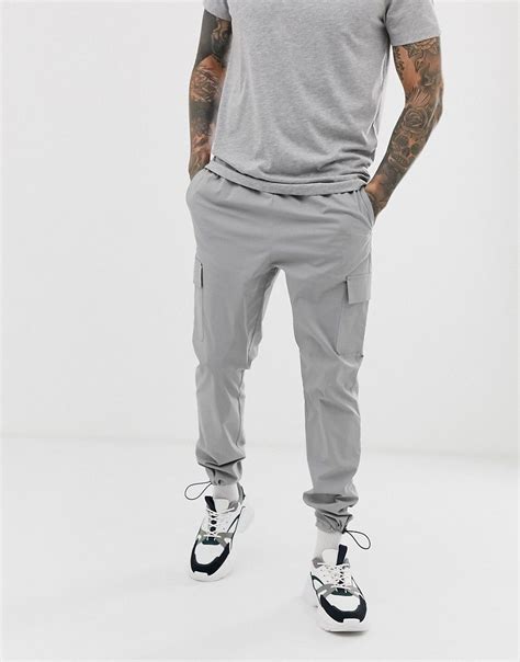 asos design tapered cargo pants  gray nylon gray asosdesign nylons asos pantalon cargo