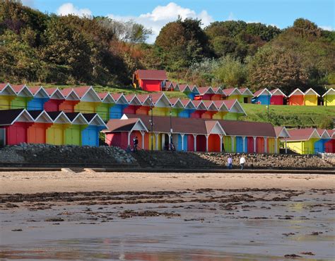 colourful beach huts north bay scarborough visit yorkshire beach hut seaside towns