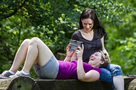 Girlfriends At Park Sharing Tablet Horizontal Royalty